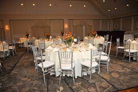 These Warm Bright Colored Centerpieces Make Our Grand Ballroom Feel Nice And Cozy Sp Outdoor Wedding Venues Destination Wedding Venues Country Club Wedding