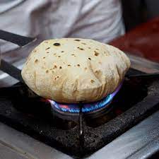 Garlic Naan Recipe Simple Flaky Indian Flatbread Recipe Indian Food Recipes Recipes Chapati