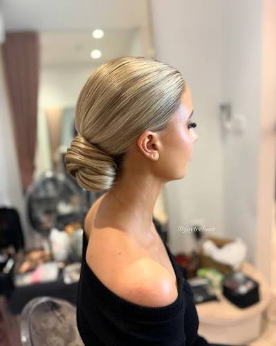 JENN TRINH - Melbourne Hairstylist | Sleek low bun for yesterday's photoshoot. I love that it's sleek but there's still some texture and movement - especially in the bun. Key... | Instagram