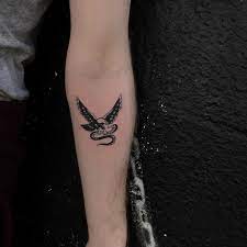 Tiny Eagle And Snake Tattoo By Yeahdope Inked On The Left Forearm Eagle And Snake Tattoo Tattoos Snake Tattoo