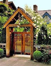 5 Inexpensive Ways To Make Your Garden Gate Simply Enchanting Gardenbunch Garden Gate Design Garden Gates And Fencing Garden Entrance