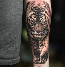 No rebuffing that tiger tattoos are the best animal tattoos designs among both men and women. Tiger Tattoos For Men Mens Tiger Tattoo Tiger Tattoo Design Animal Tattoos For Men