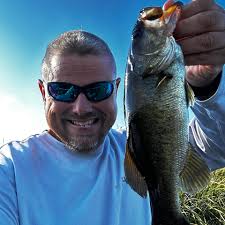 Should I upgrade to a trolling motor with spot lock or shallow water  anchors?