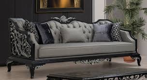 A luxurious dark living room with black walls, purple chairs, a grey faux fur rug and some brass touches for a chic look. Casa Padrino Luxury Baroque Sofa Silver Black Living Room Sofa In Baroque Style Baroque Living Room Furniture Noble Magnificent