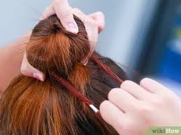 Slide donut over your ponytail, making sure it sits in place right over the hair tie. How To Do A Doughnut Bun Without A Doughnut 10 Steps