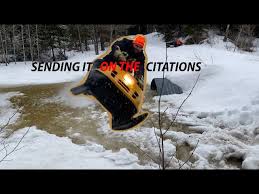 Snowmobiling out of Lewiston, MI