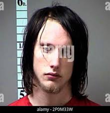 This undated photo provided by the St. Charles County Prosecuting  Attorney's Office shows Robert Burnette, of Wentzville, Mo. Burnette and Megan  Hendricks, were arrested last week and charged with child abuse causing  serious injury to their 6-week-old ...