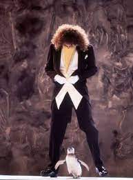 Brian May With A Penguin Brian May Queen Brian May Queen Photos
