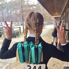 At A Horse Show An Equestrian Girl Gives Her Bowdangles Horse Show Bows Two Thumbs Up Horse Show Mom Show Horses Cute Ponies