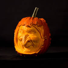 A halloween witch flying on a broom with a full moon night sky fall in backyard with leaves falling from trees and halloween pumpkin scarecrow, autumn background. Pumpkin Carving Sand In Your Eye