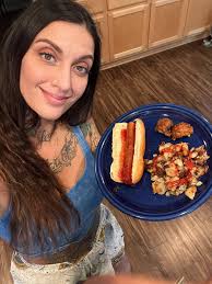 Homemade fried potatoes with sweet onion and hotdogs