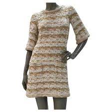 From a thickly knit cardigan worn with a cropped white cotton evening dickey and micro shorts to liquid. 5950 Chanel Knit Teeed Paris Dubai Cruise Dress Sz 36 Multiple Colors Cotton Viscose Ref 201957 Joli Closet