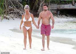 The singer shared a string of photos of herself and ryan exploring the city back in may. Kerry Katona Strolls Hand In Hand With Boyfriend Ryan Mahoney In The Maldives Daily Mail Online