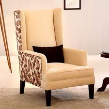 Buy Edwina Wing Chair Ivory Online In India From Wooden Street Wing Chairs Are A Decorating Staple For Every Home Warm The Wing Chair Chair Buy Chair
