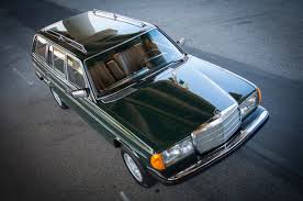 Red with a black interior. 825 Tiefgrun Deep Green 1976 1979 W123 Drive2