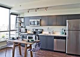 A one wall or single line kitchen keeps all the cabinets, appliances against one wall of the home to save space. Single Wall Kitchen Design One Wall Kitchen Kitchen Layout Grey Kitchen Cabinets