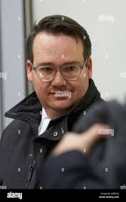 Koblenz, Germany. 28th Jan, 2020. The presiding judge Anne Kerber opens the  hearing in the courtroom of the Higher Regional Court. A Syrian defendant  is accused of having posed for a photograph