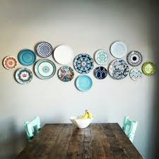 Enjoy the appearance of baked enamel plates, decorated with bright floral designs and displayed against a metal scrollwork frame. How To Hang Plates On The Wall The Design Salad Plate Wall Decor Plates On Wall Hang Plates On Wall