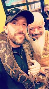 The young man struggled with two 500kg giant pythons in an abandoned lake