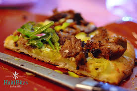 Green Tomato Griot Pizza With Arugula Pikliz And Avocado Chutney Haiti Bites Haitian Food Recipes Chutney Food