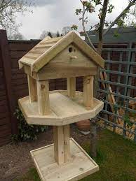 Overhang is largest on front, 3/4 off the back, and 1 on each side. Google Image Result For Http Www Churnetvalleygardenfurniture Co Uk Images Portfolio Birdtable Bird Wooden Bird Houses Bird House Feeder Homemade Bird Houses