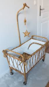 cradle of rattan for doll vintage dress in liberty meuble bebe berceau poupee berceau