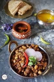 Punjabi Pindi Choley Punjabi Style Spicy Garbanzo Recipe Spicy Recipes Classic Dishes Punjabi Cuisine