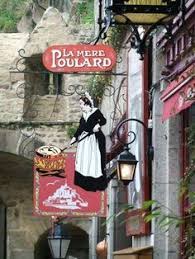 La Mere Poulard Is A Restaurant And Hotel On Mont Saint Michel France Shop Signs Signs Storefront Signs