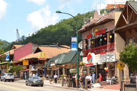 The Gatlinburg Strip It Is So Fun To Walk Down This Sidewalk Tennessee Vacation Road Trip Places Gatlinburg