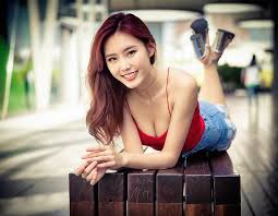 A character or person depicted has red colored hair. Hd Wallpaper Asian Women Looking At Viewer Dyed Hair Smiling Red Tops Wallpaper Flare