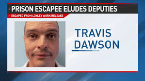 Escaped Alabama inmate steals minivan with machete