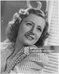 696 Irene Dunne Wearing Photos & High Res Pictures