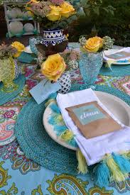 He purchased an entire table setting, rugs, cushions and throws are from kmart. Moroccan Dinner Party Black Twine