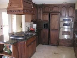 If you like a darker tone: Photo Of Dark Restained Oak Cabinets Restaining Kitchen Cabinets Oak Kitchen Kitchen Cabinets Decor