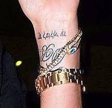 Beckham's tattoo of jesus, which is on his torso, is taken from the painting the man of sorrows by matthew r brooks want to find out what some of david beckham's tattoo design symbols mean? Victoria Beckhams 5 Tattoos Ihre Bedeutung Promi Tattoos