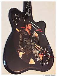 Some of the most popular and beautiful clocks are shown here. Elvis Presley Guitar Clock Elegantly Styled Vintage Elvis Wall Clock In Shape Of Guitar Wood Lacquered Wall Art Rock Around The Clock Rock Around The Clock Lacquered Walls Clock