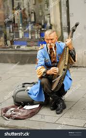 Download Ukrainian Gusla Player Royalty Free Images Stock Photography Ssuaphoto Bandura Cossack Kossak Actor In 2020 Stock Photography Stock Photos Photo