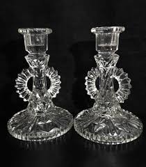 This type of holder prescriptively includes a closed arena, that holds a tea light or a votive candle good graces oneself. Vintage Elegant Glass Candlestick 2 Clear And Similar Items