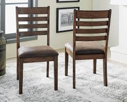 Ashley furniture signature design hammis dining room chair set of 2 dark brown. Royard Dining Room Chair By Ashley Furniture Nis105514253 Millerhome Furniture Mattress
