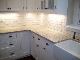 Famed for its simplicity and sophistication, subway tile has been popular for many years and is seeing a real surge in popularity in modern times. Subway Tile Backsplash Kitchen Ideas Gray White Mini Diy Glass Bevele White Subway Tile Backsplash White Tile Kitchen Backsplash White Kitchen Backsplash