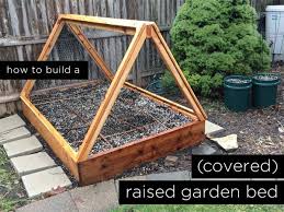 Use pieces of 2x4 in each corner to secure the sides to each other. How To Build A Covered Raised Garden Bed Rather Square Vegetable Garden Raised Beds Building A Raised Garden Building Raised Garden Beds