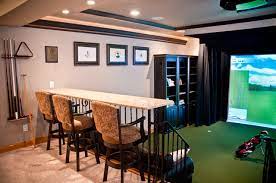 If you want to improve your game over the winter, you need to practice. River Glen Basement Expansion Golf Simulator Klassisch Modern Wohnzimmer Indianapolis Von Homes By C M Watson Houzz