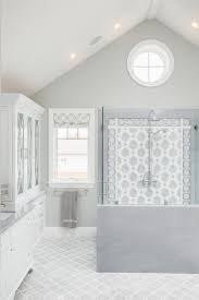 Arabesque floor tile is timeless, so it is perfect for creating visually appealing spaces in both new and old homes. White And Gray Mosaic Shower Tiles Contemporary Bathroom