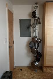 Pots and pans seem to pour out of the cupboards? Stolmen Vertical Pot Rack Ikea Hackers