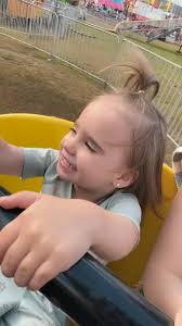 Clov's first time at the Deerfield Fair and she's loving the bumblebee...