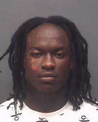 2 men arrested, 1 woman wanted after police find gun, heroin, counterfeit  money in High Point