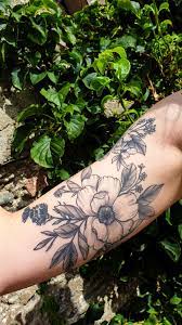 It resonates with the ambitious japanese legend of the koi fish transforming into a dragon. 1 2 Of My Floral Half Sleeve It Wraps All The Way Around Artist Lydia Hazelton Fox And Dagger Tattoo Ormskirk Tattoos