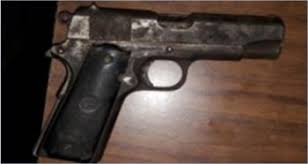 Resultado de imagen para arma de fuego con dos cartuchos útiles calibre .22 mm.