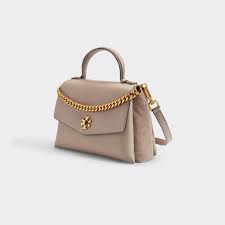 Please enable it to continue. Tory Burch Kira Mixed Materials Top Handle Bag In Grey Leather In Gray Lyst