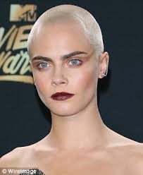 Cara Delevingne's pixie cut & Valerian premiere looks